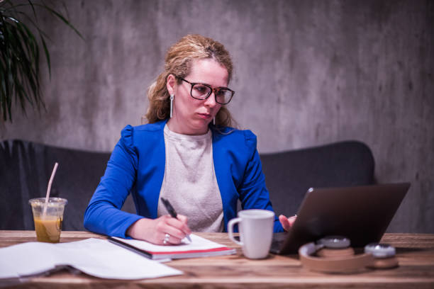 istock Curly female working in modern office. 1250136338