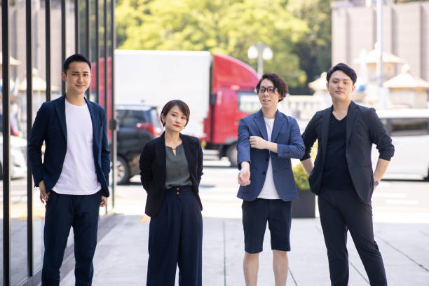istock Young Entrepreneurs standing in city 1250138199