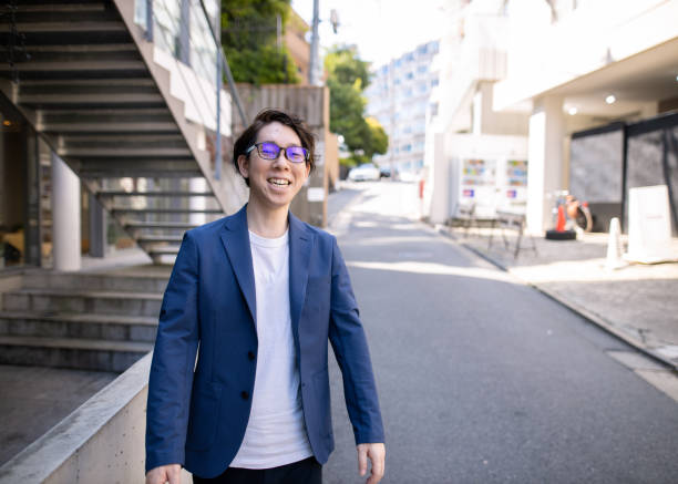 istock Young businessman walking in city 1250138208