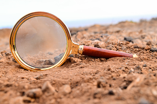 Magnify Glass Abandoned On The Rock Desert
