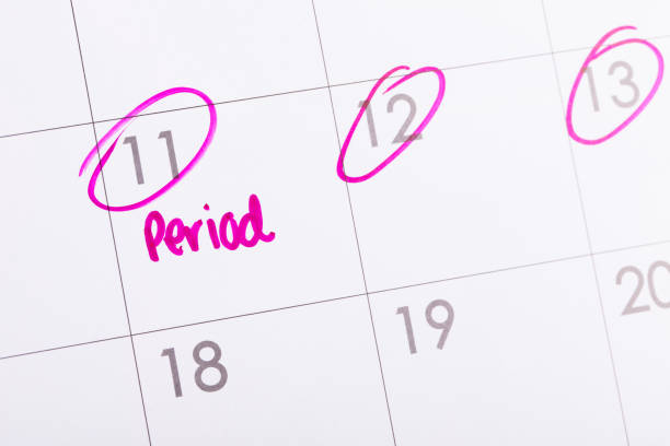 istock Period due date marked on calendar in pink with copy space 1250143930