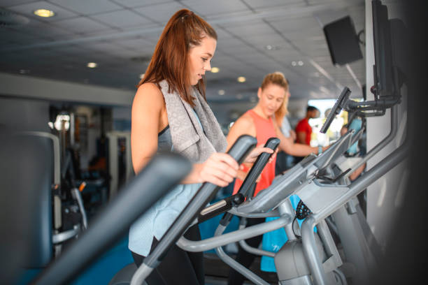 istock Young Caucasian Women Beginning Workout on Cross Trainers 1250143974