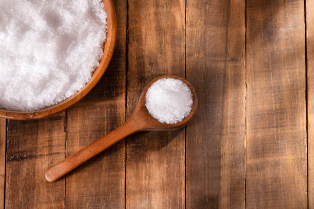 istock Magnesium chloride in wooden spoon - Text space 1250151689
