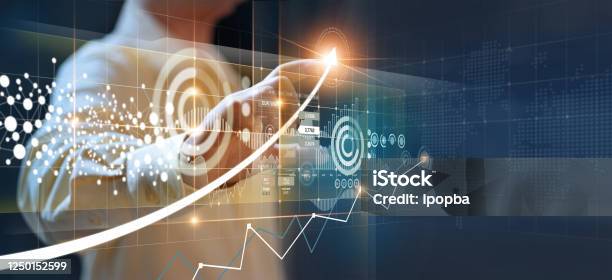 Businessmen Point To Arrows And Business Growth Graphs On A Modern Virtual Interface On Global Network Banking Stock Market And Currency Exchange Stock Photo - Download Image Now
