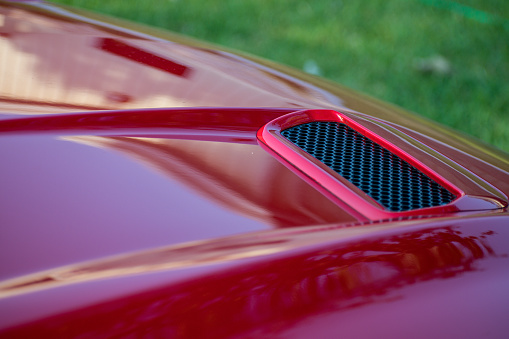 A close up shot of a sports car at sunset in Texas.
