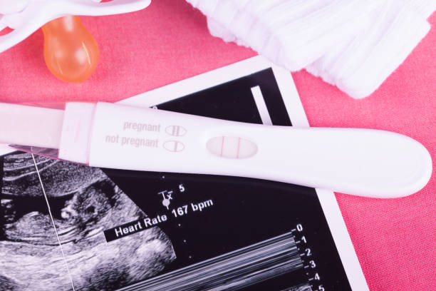 istock Ultrasound photo & pregnancy test 1250162103