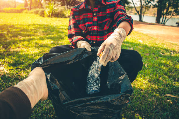 istock Group of people help garbage collection for to keep clean and take  recycling. 1250164308
