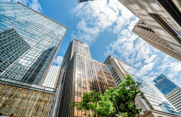 istock Looking up at modern skyscrapers 1250164381