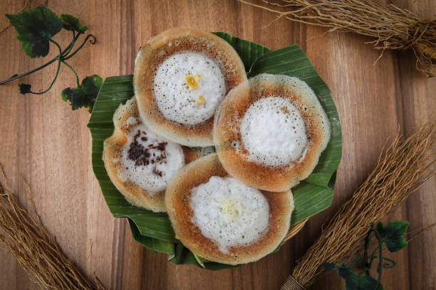 Serabi solo Serabi Solo is Pancake a snack food with soft texture on solo pancake obtained from the basic ingredients in the form of rice flour. Combined with coconut milk, granulated sugar and pandan leaves make pancakes have a savory, sweet and legit taste. central java province photos stock pictures, royalty-free photos & images