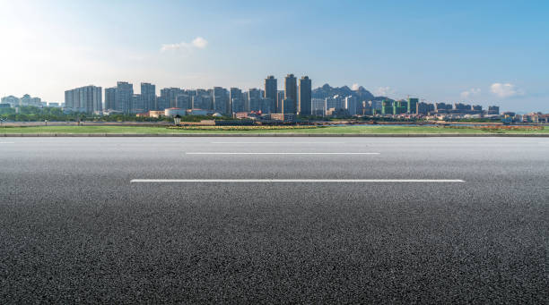 istock Road surface and urban architectural landscape 1250173832