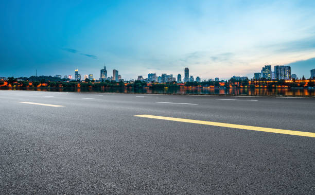istock Road surface and high-rise buildings 1250174907