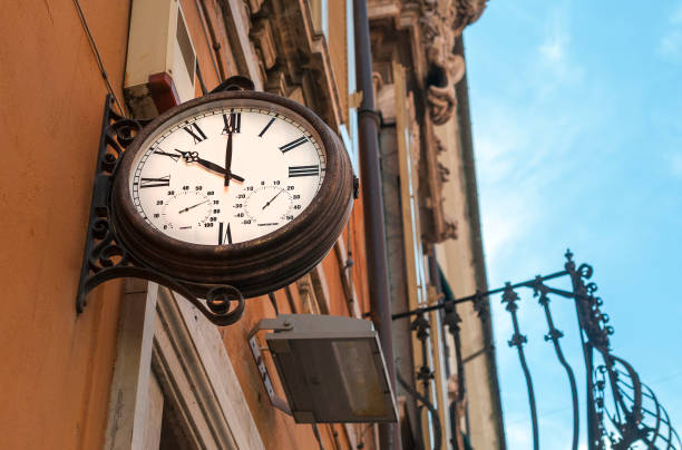 istock Old style street clock at 10 am in Italy 1250177203