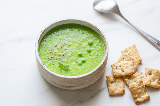 Plate of summer delicious traditional finnish pea soup.Creamy pea soup