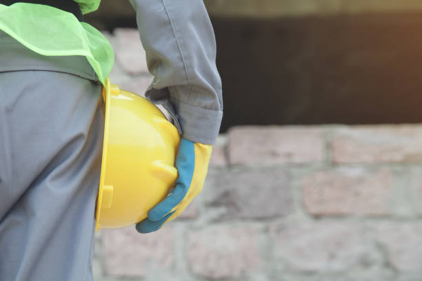 istock Construction worker with helmet in outdoors. 1250178624