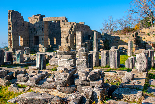 blue sky and white clouds on the Roman ruins of Timgad in Algeria, World Heritage Site by UNESCO