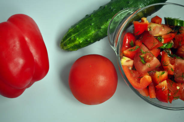 istock fresh bright vegetables for salad - tomato, cucumber, pepper 1250182919