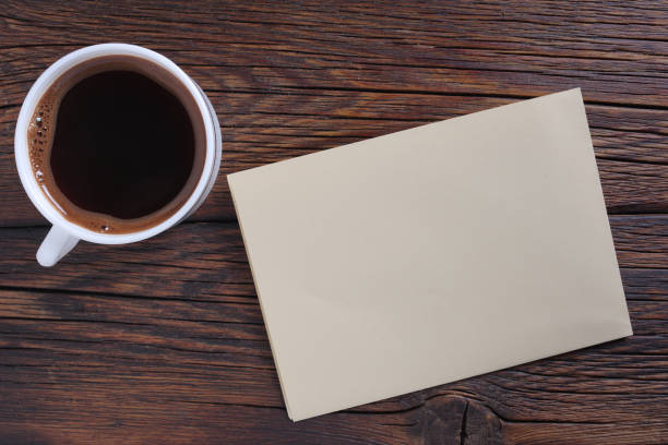 istock Coffee and a blank of paper 1250188170