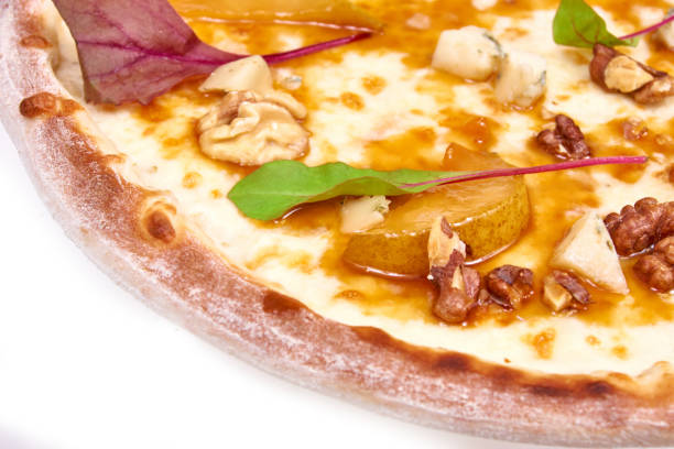 istock Pizza with pear and rucola isolated on white background 1250190219