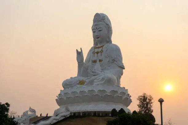 Big Guanyin at Huai Plakang temple in Chiangrai Thailand  during twilight sunset time, public place in north of Thai Asia