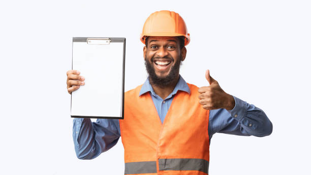 istock Black Architect Approving Construction Building Project Gesturing Thumbs-Up, White Background 1250194262