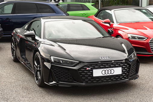 Staffordshire, England - 16 June 2020: A new Audi R8 Coupe Sports Car on the forecourt at an Audi dealership. The R8 has a 5.2 litre V10 engine.