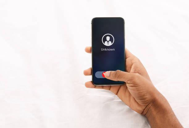 istock Female Hand Holding Phone With Incoming Call From Unknown 1250198759