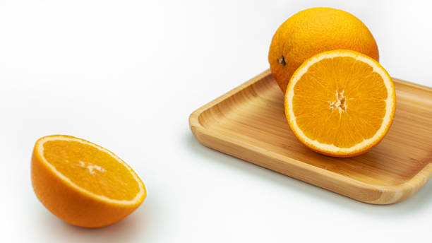 istock Bright, juicy, sweet oranges on the white background 1250199557