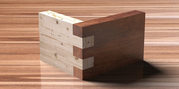 Wooden box joint jig, dovetail connection concept. Woodworking of corner assembling with finger joints isolated on wooden background. Closeup. 3d illustration