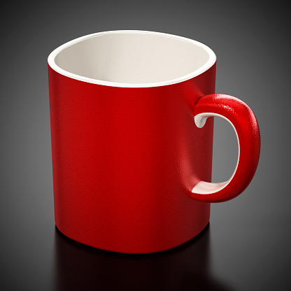 Red empty coffee mug on black background.