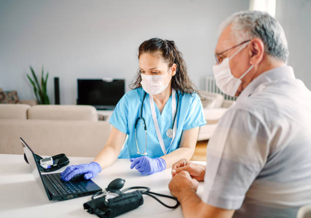 istock Healthcare worker at home visit 1250203814
