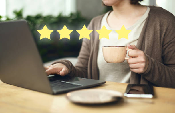 istock Female showing feedback with Excellent five star rating 1250208644