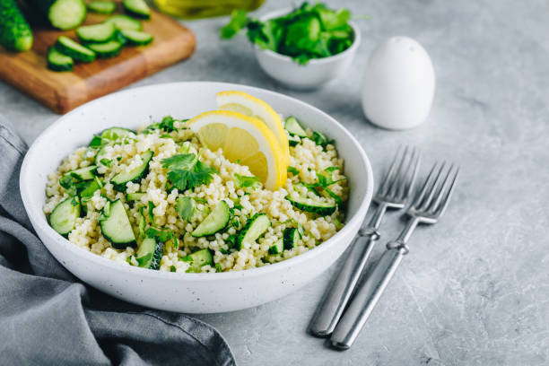 istock Lemony Cucumber Couscous Salad in bowl 1250208947