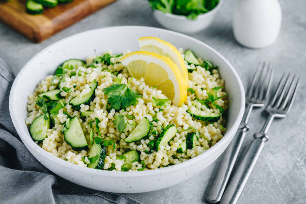 istock Lemony Cucumber Couscous Salad in bowl 1250208974