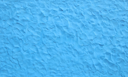 Fondo de textura de plastilina azul. photo