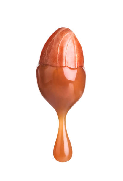 istock Peanut dipped in caramel  isolated on white background 1250212294