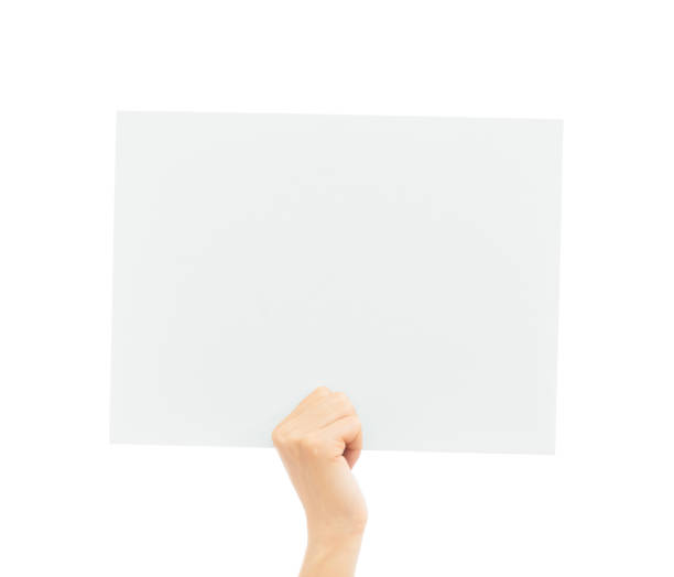 istock Woman hand rise up a blank white placard for copy-space. 1250214406