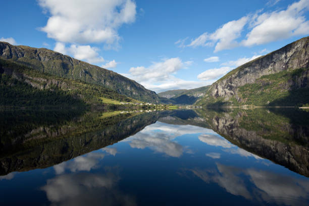istock Amazing Reflection of Norwegian Mountains on Lake, Norway 1250214768