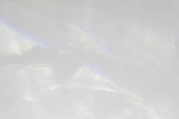 diagonal shadow and rays of light on a white background