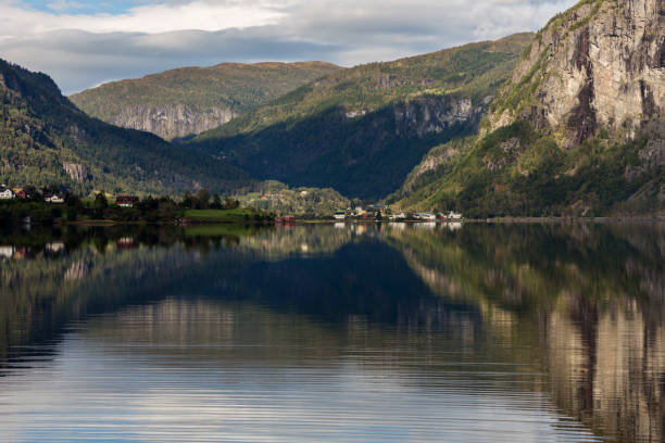 istock Amazing Reflection of Norwegian Mountains on Lake, Norway 1250214811
