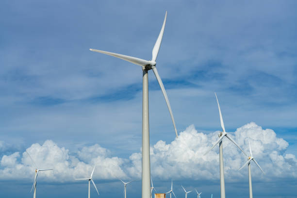 istock Wind turbines or wind energy converter in sunny day 1250214896