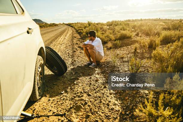 Nothing To Do But Sit And Wait For Some Roadside Assistance Stock Photo - Download Image Now