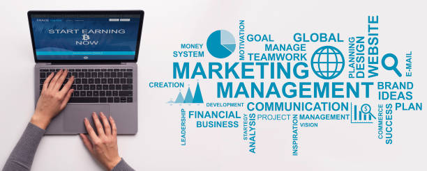 istock Hands typing on laptop keyboard and management, marketing lettering 1250219072
