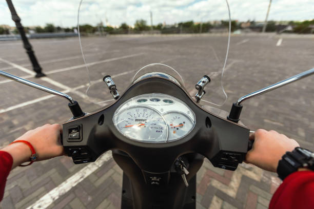 Unrecognizable Guy Driving Motorbike Outdoors, Hands On Motorcycle Wheel, POV