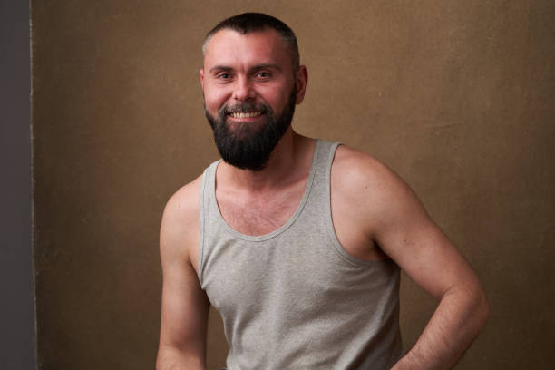 istock Strong bearded man. Portrait of a handsome man with a beard 1250221144