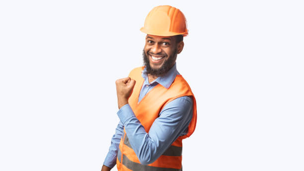 istock Joyful Black Construction Worker Gesturing Yes On White Background, Panorama 1250221364