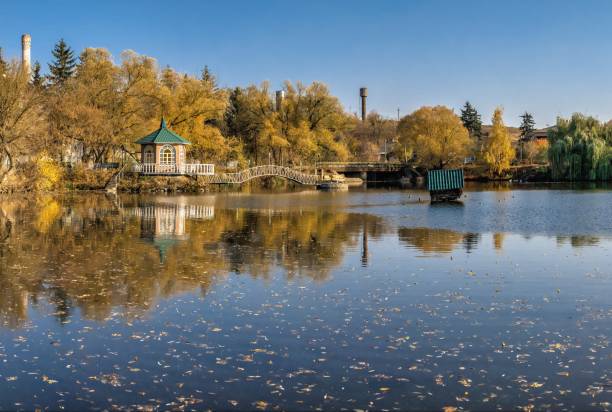 istock Sunny autumn evening on the blue lake 1250224148