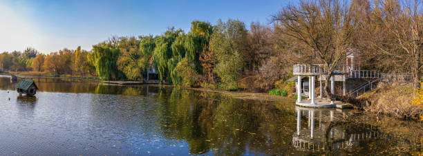 istock Sunny autumn evening on the blue lake 1250224182