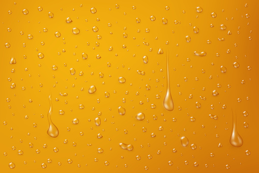 Transparent water drops on the yellow surface, vector illustration