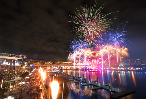 The amazing fireworks in celebration New Years Eve 2017 at Darling Harbour, Sydney, NSW, Australia. This photo was captured from Pyrmont Bridge and features the harbour and the city skyline.