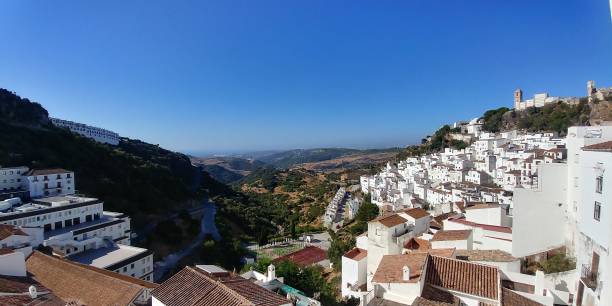 Panorama of Casares, Spain Casares, Spain – July 29, 2019: Panorama of Casares, one of the most beautiful white villages in Costa del Sol. casares photos stock pictures, royalty-free photos & images